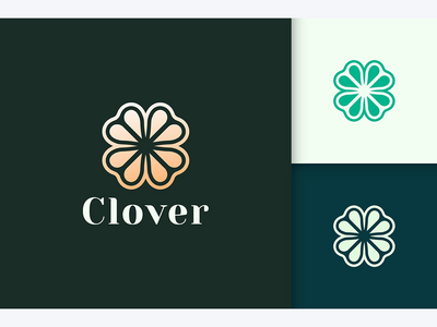豪华金色的三叶草叶标志(Clover Leaf Logo in Luxury Gold Color)